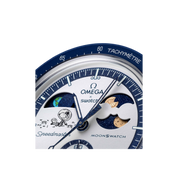 Swatch x Omega Bioceramic Moonswatch Mission To Earthphase Snoopy Gold Beaver Moon close-up detail at Stashed UAE