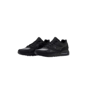 Nike Air Max IVO LTR Triple Black pair at Stashed UAE