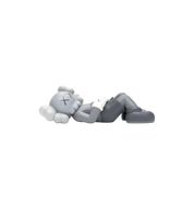 KAWS Holiday Japan Vinyl Figure Grey at Stashed UAE