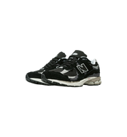 New Balance 2002R Protection Pack Black Grey pair at Stashed UAE